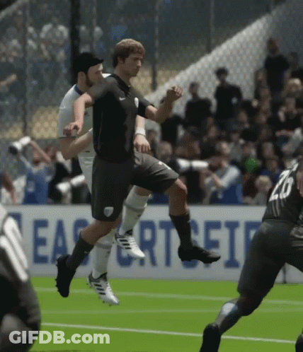 A Soccer Game Is Being Played In Front Of An Easports Sign GIF