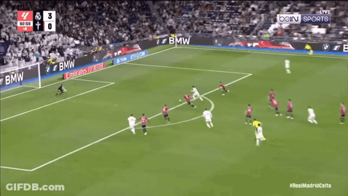 A Soccer Game Is Being Played In Front Of An Emirates Fly Better Banner GIF