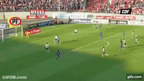 A Soccer Game Is Being Played On A Field Sponsored By Coca Cola GIF