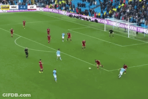 A Soccer Game Is Being Played On A Field That Has A Banner For Nexen Tire GIF
