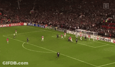 A Soccer Game Is Being Played On A Field That Has A Ford Advertisement On It GIF