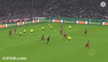 A Soccer Game Is Being Played On A Field That Has Advertisements For Bitburger GIF