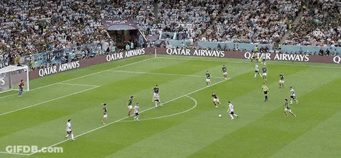A Soccer Game Is Being Played On A Field That Has Qatar Energy Written On The Sidelines GIF