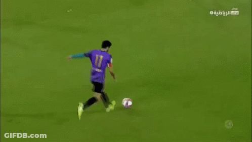 A Soccer Game Is Being Played On A Field With A Banner That Says Muradala GIF