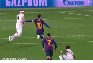A Soccer Game Is Being Played On A Field With A Gazprom Sign In The Background GIF