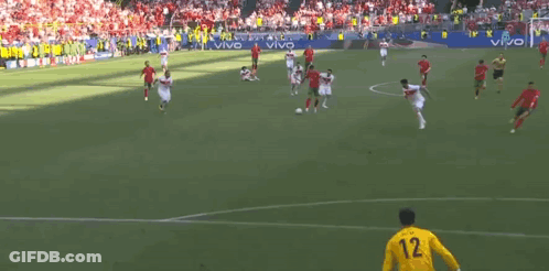 A Soccer Game Is Being Played On A Field With A Goalie Wearing A Yellow Jersey With The Number 20 On It GIF