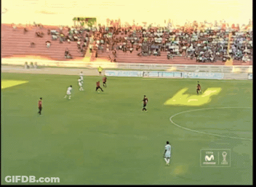 A Soccer Game Is Being Played On A Field With A M Logo On The Corner GIF