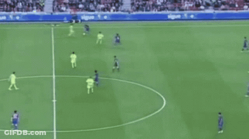 A Soccer Game Is Being Played On A Field With A Nike Ad Behind The Goal GIF
