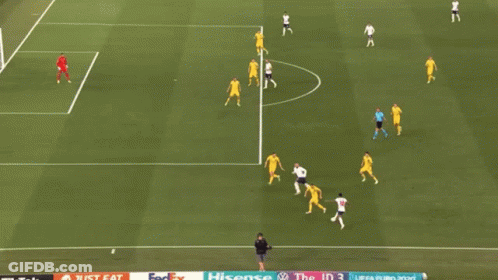 A Soccer Game Is Being Played On A Field With A Sign That Says ' United Airlines ' On It GIF