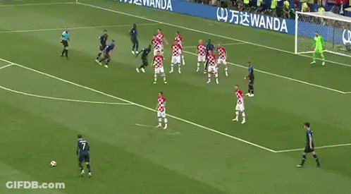 A Soccer Game Is Being Played On A Field With A Wanda Banner GIF