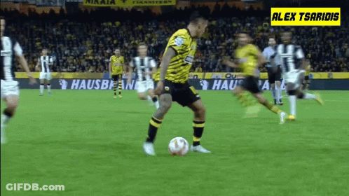 A Soccer Game Is Being Played On A Field With Ads For Hausbean And Alex Tsaridis GIF