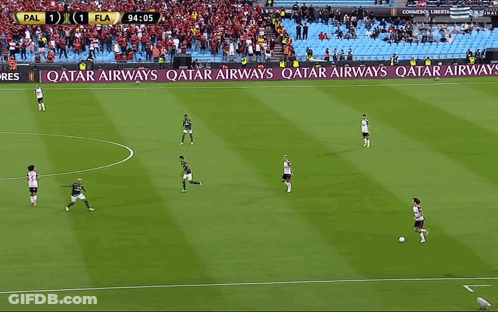 A Soccer Game Is Being Played On A Field With Ads For Qatar Airways And Betfair GIF