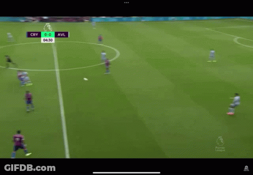 A Soccer Game Is Being Played On A Field With Bk8.com Advertisements On The Sidelines GIF