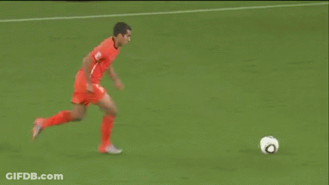 A Soccer Game Is Being Played On A Field With Coca Cola Advertisements GIF