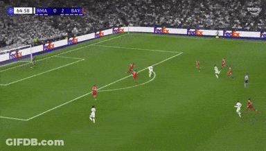 A Soccer Game Is Being Played On A Field With Fedex Ads On The Sidelines GIF