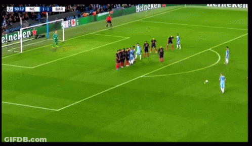 A Soccer Game Is Being Played On A Field With Heineken Ads GIF