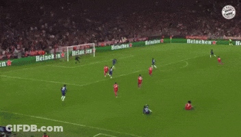 A Soccer Game Is Being Played On A Field With Heineken Advertisements On The Sidelines GIF