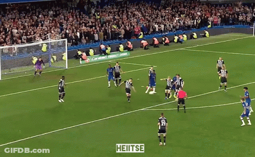 A Soccer Game Is Being Played On A Field With Heitse Written In The Corner GIF