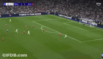 A Soccer Game Is Being Played On A Field With Pepsi Advertisements GIF