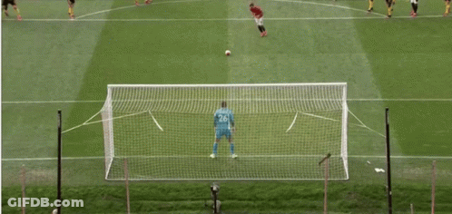 A Soccer Game Is Being Played On A Field With Players In Yellow And Black Jerseys GIF