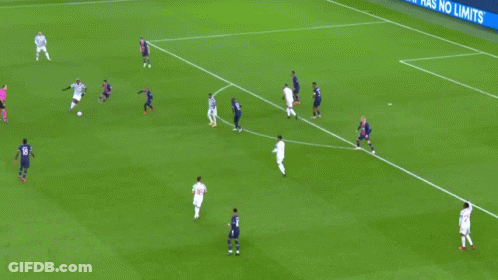 A Soccer Game Is Being Played On A Field With Ps5 Advertisements In The Background GIF