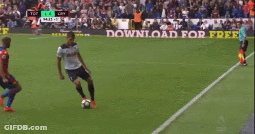 A Soccer Game Is Being Played On A Green Field GIF