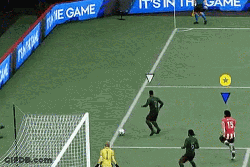 A Soccer Game Is Being Played On A Soccer Field . GIF