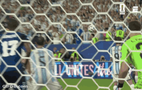 A Soccer Game Is Being Played With A Banner Behind The Net That Says " Lunes " GIF