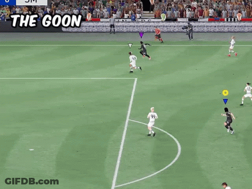 A Soccer Game Is Being Played With A Sign That Says The Goon GIF