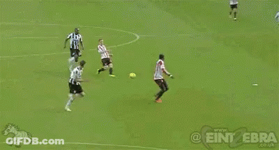 A Soccer Game Is Being Watched By A Crowd Of People GIF