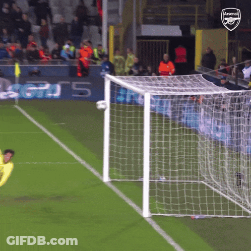 A Soccer Goal With The Arsenal Logo On The Back GIF