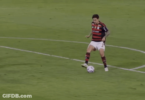 A Soccer Goalie Catches A Soccer Ball In A Net With The Letter B On It GIF