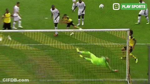 A Soccer Goalie Is Diving To Catch A Soccer Ball During A Game Sponsored By Play Sports . GIF