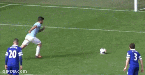 A Soccer Goalie Is Diving To Catch A Soccer Ball In The Goal GIF