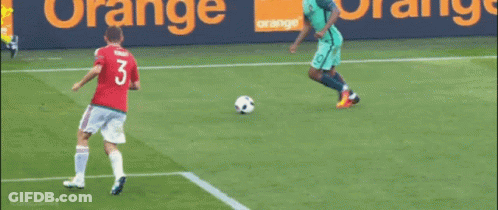 A Soccer Goalie Jumps To Catch A Soccer Ball In Front Of A Net That Says Iconic James GIF