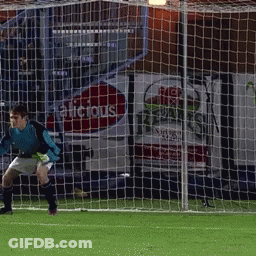 A Soccer Goalie Stands In Front Of A Net That Says Alicious On It GIF
