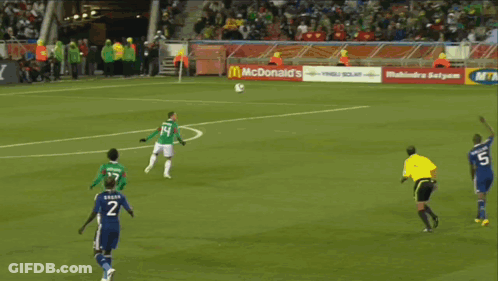 A Soccer Goalie Stands In Front Of A Seara Advertisement GIF