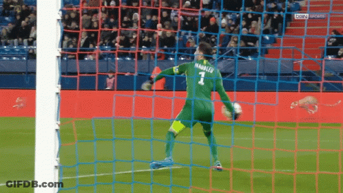 A Soccer Goalie With The Number 1 On His Back GIF
