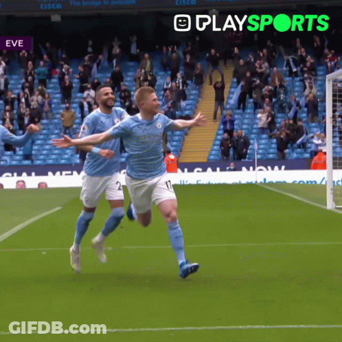 A Soccer Player Celebrates A Goal In Front Of A Playsports Banner GIF