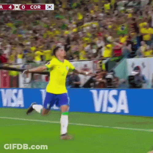 A Soccer Player Celebrates A Goal In Front Of A Visa Ad GIF