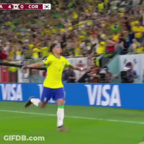 A Soccer Player Celebrates A Goal In Front Of A Visa Banner GIF