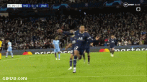 A Soccer Player Celebrates A Goal With His Teammates GIF