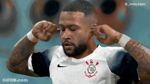 A Soccer Player Covering His Ears With His Hands GIF