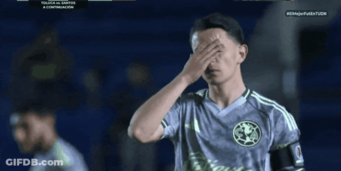 A Soccer Player Covering His Face During A Toluca Vs. Santos Game GIF