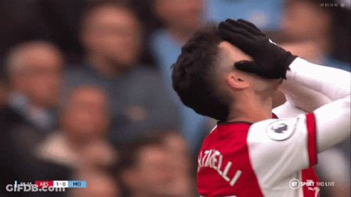 A Soccer Player Covering His Face With His Hands While Watching A Game On Bt Sport GIF