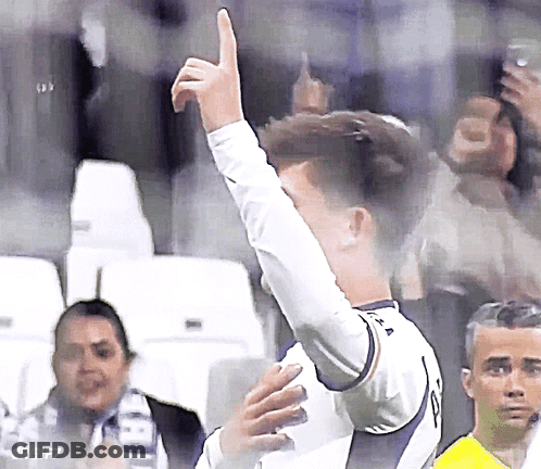 A Soccer Player Giving A Thumbs Up In Front Of The Crowd GIF