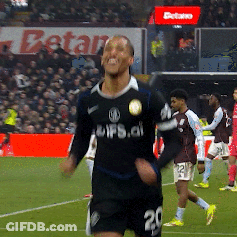 A Soccer Player In A Black Jersey With The Number 20 On It GIF