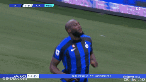 A Soccer Player In A Blue And Black Jersey With The Number 90 On It GIF