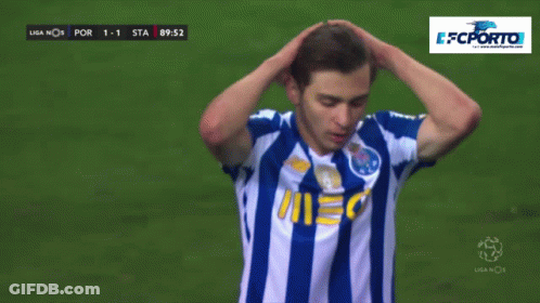 A Soccer Player In A Blue And White Striped Shirt Holds His Hands To His Head GIF
