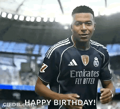 A Soccer Player In A Blue Emirates Fly Better Jersey Is Running On A Field . GIF